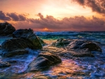 rocky waves at sundown