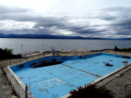 Derelict Pool - pool, graffiti, sea, cloudy, abandoned