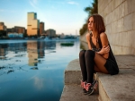 sitting on a river bank