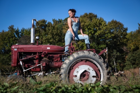 Cowgirl At Work.. - style, girls, western, women, tractor, models, hot, ranch, outdoors, brunettes, cowgirl, fun, female, boots, fashion