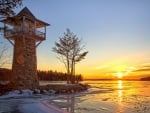 Lighthouse at Sea Sunset