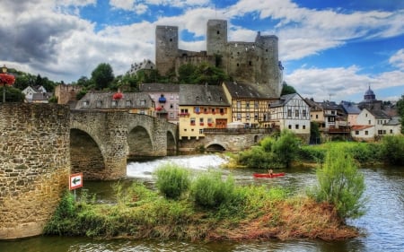 bridge by a castle