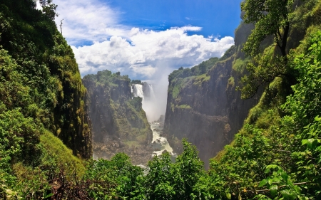 Victoria Falls, Zambia - sky, mountains, clouds, river, valley, trees