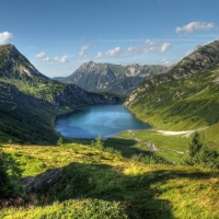 Green mountain lake landscape