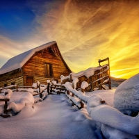 Wooden mountain house in winter