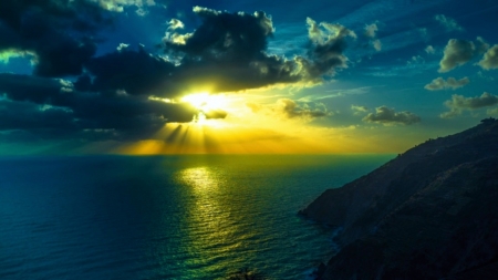 Upcoming Storm at Sunset - sky, clouds, sunrays, colors, sea