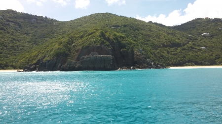 Bay side beauty - hills, blue, beach, sand, mountain, view, sky, clouds, Island, trees, water, rock, sea, ocean, tropical, green, waves, bay