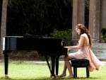 Lovely Girl Playing Piano