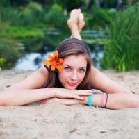 Girl Lying on the Sand