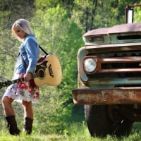 Cowgirl With Guitar