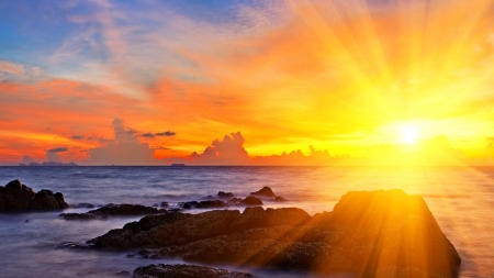 Blinding Sunrise - beach, light, sun, rocks, bright, nature, clouds, sunrise, sea