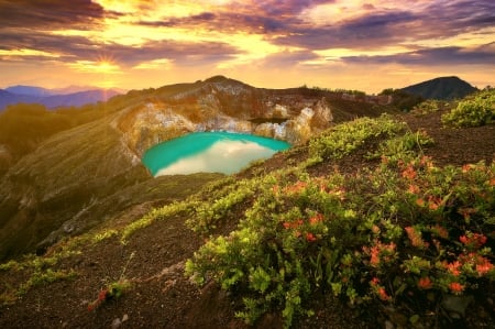 Sunrise at Mt. Kelimutu - clouds, beautiful, sunrise, mountain, wildflowers, glow, rays, view, lake, sky