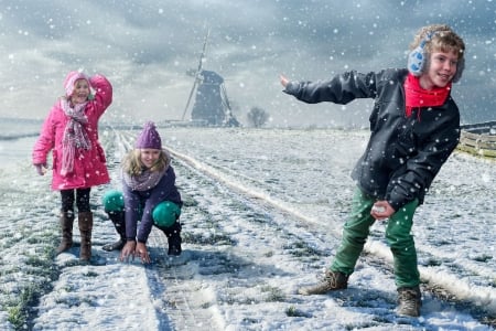 Winter fun - fun, winter, people, mill, snow, girl, adrian sommeling, creative, pink, copil, child, boy, fantasy, situation, field