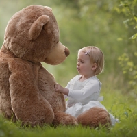 Little girl and Teddy Bear