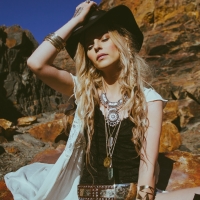 Cowgirl in the Mountains