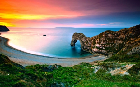 Cliff Arch By The Water At Sunset - nature, arch, beach, cliff, water, sunset, sand, sea