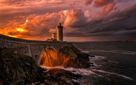 Lighthouse on the Coast - nature, sky, lighthouse, clouds, sunset, sea, bridge, coast