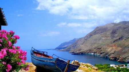 Lonely Boat on the Beach - ocean, beach, mountain, bushes, nature, clouds, blue, island, boat