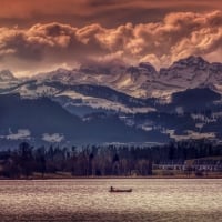 Single Boat on the River at  Sunset