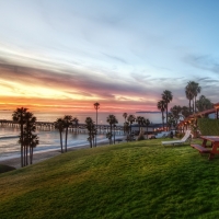 House Near Coast With Sunset