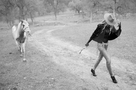 Walkin' Her Pet. . - style, girls, western, women, models, hats, ranch, outdoors, horses, brunettes, cowgirl, fun, female, boots, fashion