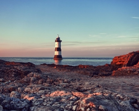 Lighthouse in the Water - stone, shore, nature, lighthouse, beach, sea