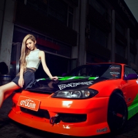 asian girl on sports car