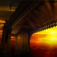 Bridge under Fiery Sunset Sky