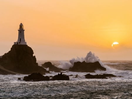 Lighthouse on The Troubled Sea - nature, horizon, sky, lighthouse, clouds, sea, rocks, waves