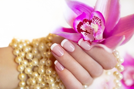 Pearls and orchid - orchid, flower, pink, jewel, stuff, hand, nails, woman, pearl