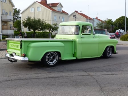 Cruising on the town at Big Power Meet Lidkoping - houses, town, car, truck, green, summer, road