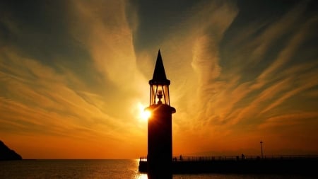 Lighthouse at Horizon Sunset - sky, lighthouse, clouds, sunset, sea, nature