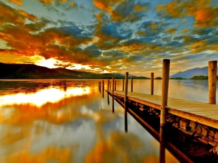 Sunset Clouds in Reflection - reflection, clouds, pier, sunset, sea, nature