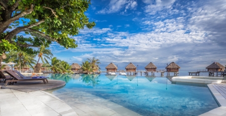 Manava Beach Resort, Moorea - huts, sky, clouds, palms, tahiti