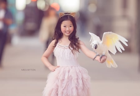 Little girl with parrot - street, girl, child, copil, pasare, bird, ears, meg bitton, cockatoo, parrot