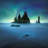 Aurora Borealis over Rocky Sea