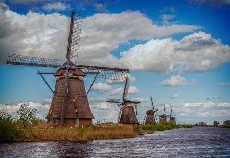 Dutch Windmills in the Netherlands - sky, the netherlands, clouds, dutch windmills, landscapes, nature