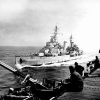 WORLD OF WARSHIPS HMS Belfast (batch 3)  Town Class Cruiser on starboard side to USS Bataan Korea 1952