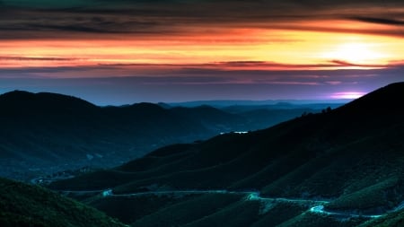 Mountain Lights - fog, road, scenic, valley, Firefox Persona theme, sunset, lights, mist, drive, mountains, sky