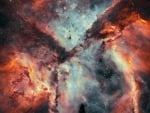 Stars, Gas, and Dust Battle in the Carina Nebula