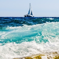 Sailing in Foamy Sea Surf
