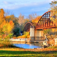 Bridge over a Lake in Autumn