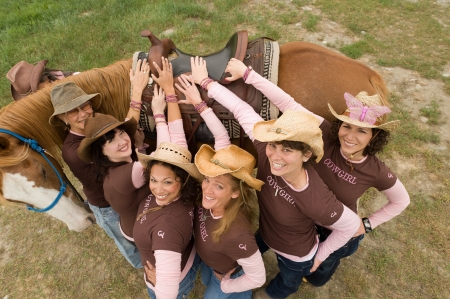 Cowgirl Tag Team . . - style, girls, women, models, hats, cowgirls, brunettes, fun, blondes, boots, fashion, horse, western, ranch, outdoors, saddle, female