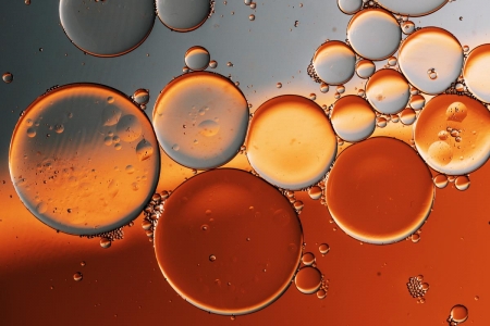 Oil drops in water - glass, drops, oil, water, orange, texture, luminos, skin