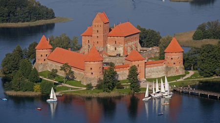 Trakai castle, Lithuania - lake, boats, roofs, castle, lithuania