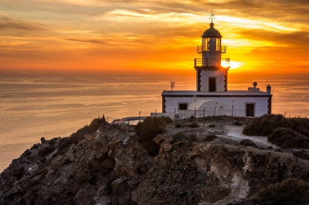 Lighthouse During Sunset - sky, lighthouse, outdoor nature, clouds, sunset, sea