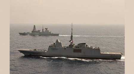 WORLD OF WARSHIPS French Navy FREMM frigate Provence (foreground) exercising with HMS Defender British Type 45 Destroyer (background) - two, warships, sea, grey overall, exercising