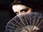 Women With Hand Fans