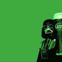 Darth Vader with a glass of Guinness beer