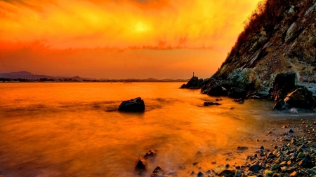 Coastal Rocks - rock, glow, beach, stones, ocean, coast, sunlight, sea, nature